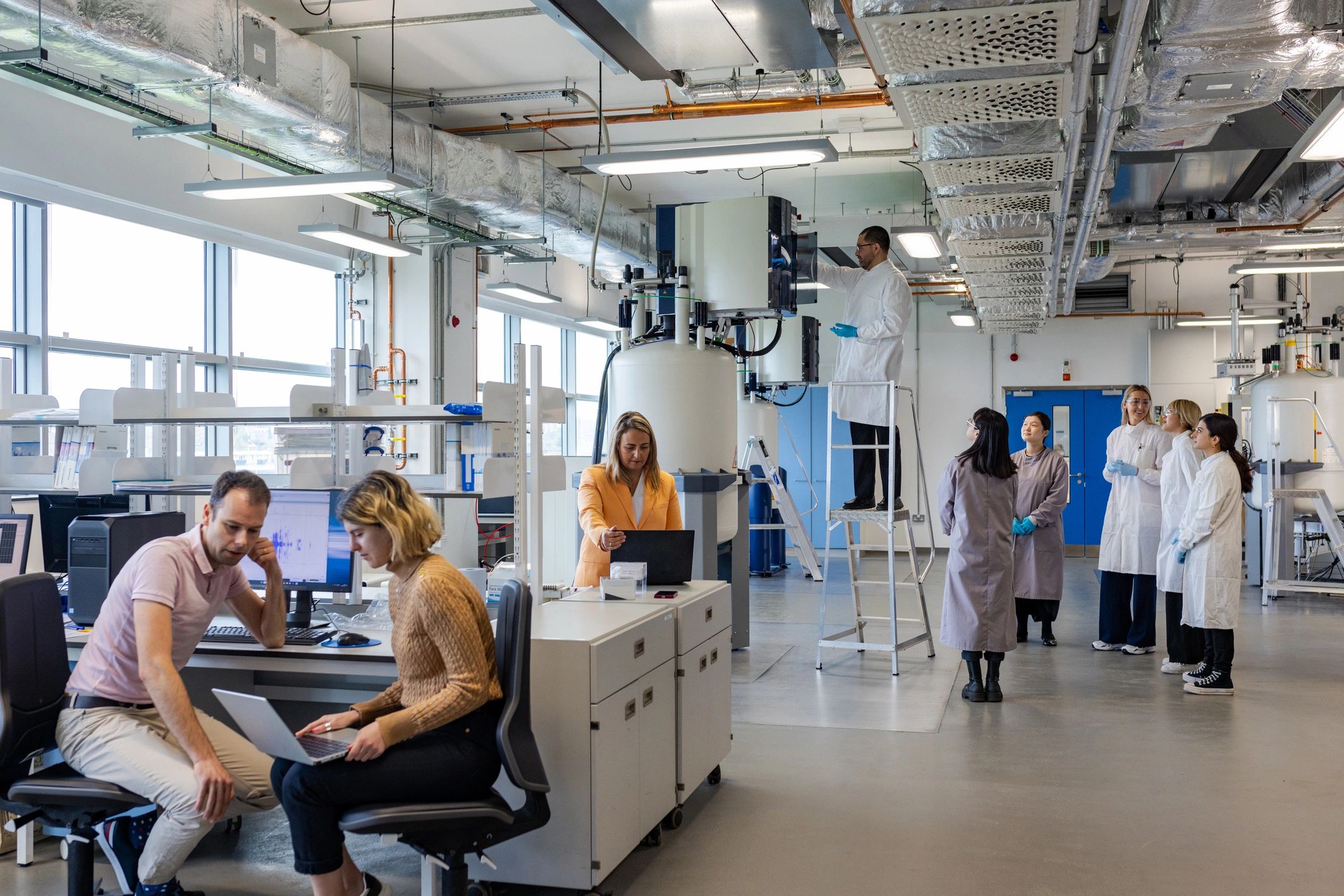 Engineers collaborating in an advanced laboratory